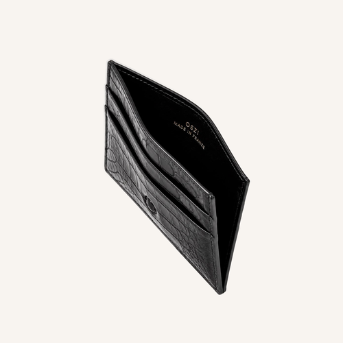 Porte-cartes OSZI First Touch en cuir d'alligator noir, ouvert sur ses compartiments à cartes